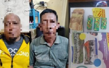 Dua Penjudi Kartu Domino Diciduk Polisi di Tengah Sawah