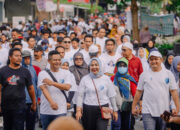 Politik Riang Gembira Nurhidayah-Imam Kafali, Komunitas Cinta Biru Kembali Bikin Jalan Sehat