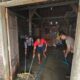 Bersama Warga, Polsek Tegowanu Bersihkan Lumpur Banjir