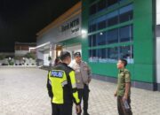 Polsek Pemenang Laksanakan Patroli Dialogis dengan Security Bank Syariah Unit Pemenang